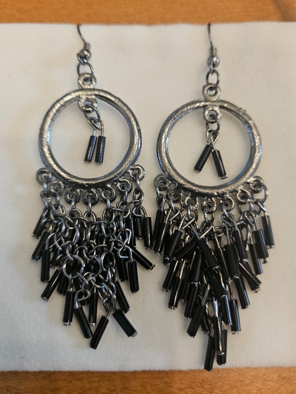 Silver plated dangly black earrings